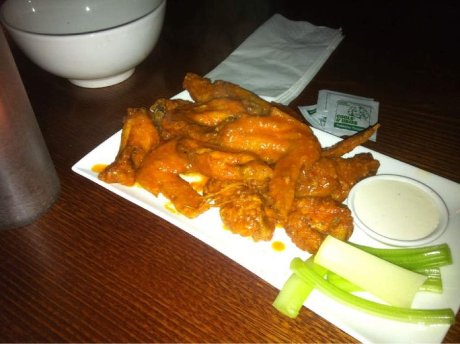 The Kodiak Club Pic 1 - A dozen buffalo wings with blue cheese dipping sauce