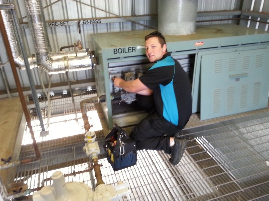 Commercial Airconditioning Services Pic 1 - Matt fixing a boiler