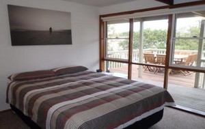 Treetops Holiday House Pic 3 - Upstairs man bedroom