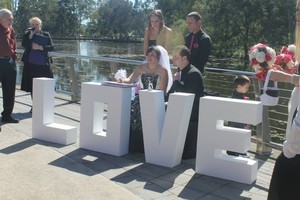 Affordable Bridal Accessories & Events Pic 5 - Our Giant LOVE letters used as the signing table