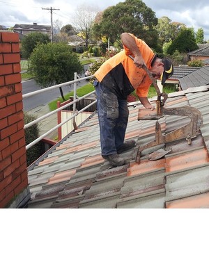 MINOR Roof Repairs Pic 4 - Broken tile replaced and repaired on the spot