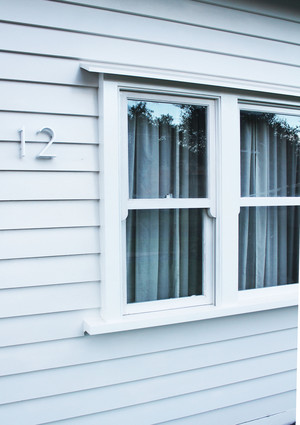 hammered Pic 3 - Hooded doublehung windows weatherboards