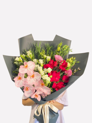 Floralta Flowers And Gifts Pic 2 - Flirt With Me Orchids Roses and colourful greens A wonderful arrangement for a loved one Available for Sydney Same Day Delivery httpswwwfloraltacomauproductstheflirtation