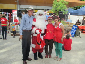 TWILIGHT STREET MARKET, WERRIBEE Pic 3 - market crew with santa