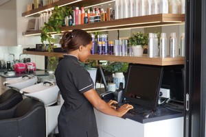 Relax & Refresh Beauty Salon Pic 3 - Maria checking the days bookings in the salon