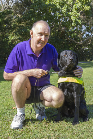 Inner Vision Massage Pic 2 - Shane with guide dog Albi