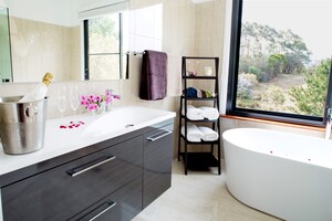 Lilypad Luxury Cabins Pic 3 - Stylish bathroom with 2 person tub and walk in shower