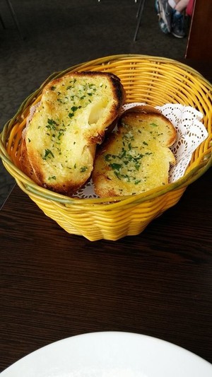 The Little Snail Restaurant Pic 3 - Garlic bread that really was dripping in delicious garlic