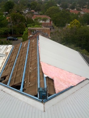 Over The Top Roofing Pic 3 - Sheeting up the valley