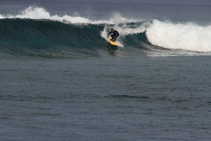 Surf Shop Pic 2 - John at the Maldives on a McTavish Epic Mal