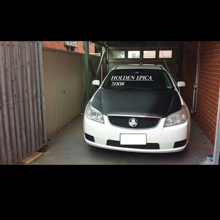 dip & wrap melbourne Pic 1 - Holden Epica hood wrapped in Black carbon fiber