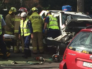 Central Coast Express Advocate Pic 5 - Woman pulled from wreckage being treated by Ambulance medics