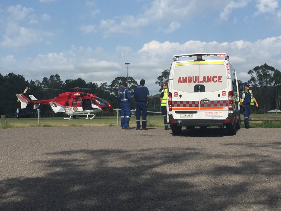 Central Coast Express Advocate Pic 1 - Ambulance crew brief flight crew at Frost Reserve Kincumber