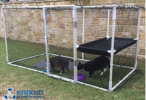 Klever Cages Pic 4 - Customer photo from Nannie of her cat enclosure to keep her fur babies safe Made with PVC pipe and connectors from Klever Cages