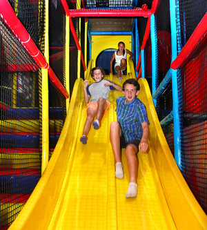 Kidz n Play Playcentres and Cafe Pic 4 - Race your friends down the speed slide