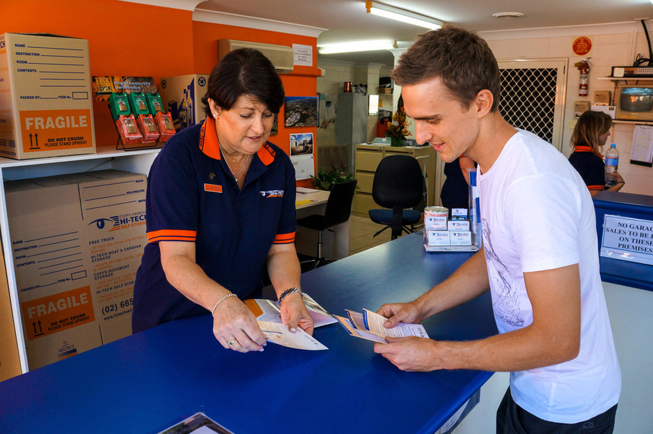 Coffs Harbour Hi-Tech Self Storage Pic 1 - Friendly staff Kay helping a client decide on the size he might need