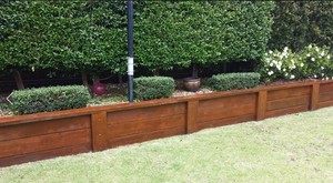 A-Z Property Maintenance Pic 5 - Retaining wall stained plus hedges gardens maintained