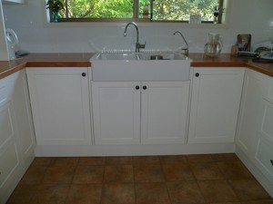 Creative Cabinets Pic 2 - Kitchen with timber top and white cupboards