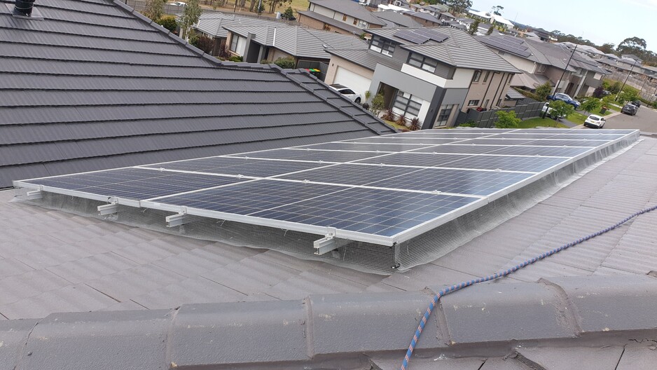 Western SYdney Solar Pty Ltd Pic 1 - Bird netting makes bird fly away to live under someone elses solar panels It is removable for servicing and repairs