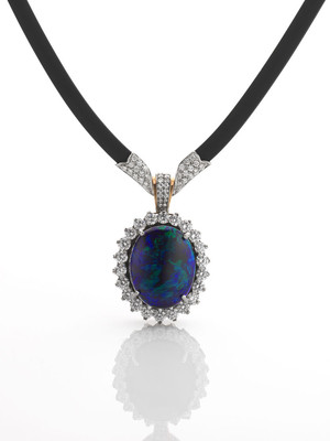 Giulians Jewellers Pic 2 - Solid black Australian opal pendant with round brilliant cut diamonds by Giulians