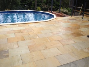 Entertaining Landscapes Pic 2 - Lovely Sandstone paved area leading up to pool edge