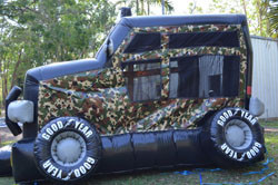 Giggling Geckos Jumping Castle Hire Pic 2 - Inflatable Army Truck We also have a bulldozer