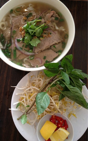 Viet Star Restaurant Pic 2 - Combination beef rice noodle soup and the bean shoots and mint leaves that come with noodle soups