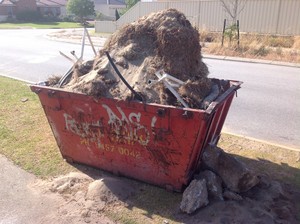 Just Skips Pic 4 - WRONG WAY TO FILL A SKIP BIN