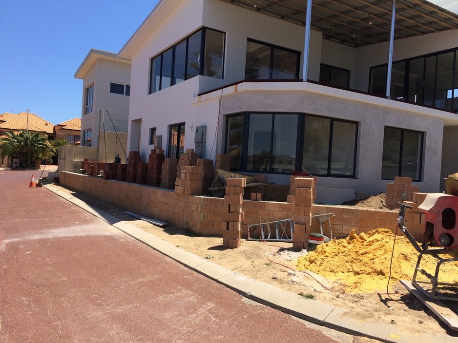 Perth Bricklaying Company Pic 1 - Rendered fence before photo