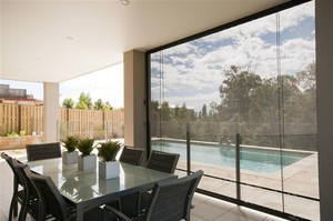 Hunter Aussie Outdoor Alfresco/Cafe Blinds Pic 4 - Black Aussie Shade Mesh Blinds blocking the heat whilst maintaining your view installed in the Newcastle area