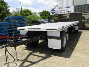 Mix Trailer Mods Pic 2 - Dog Trailers options include tri or quad axles or beavertail ramps