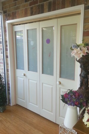 Man with Tools Cabinets and Carpentry Pic 2 - Bifold doors installed by Man with Tools