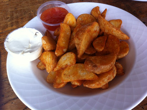 Cafe Lillies On The Park Pic 3 - Generous sized serving of wedges though they were a little undercooked