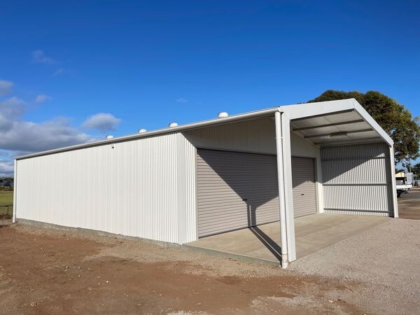 Industrial Sheds Adelaide Pic 1 - A crisp white corrugated COLORBOND steel shed ideal for commercial sheds industrial sheds custom sheds rural sheds and farm sheds in Adelaide