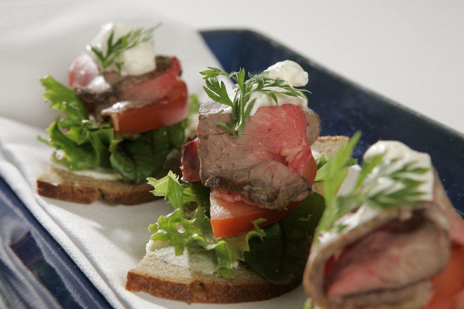 Food2U Pic 1 - An open roast beef and horseradish cream sandwich served on Brezel Bakery rye from our Gourmet Selection