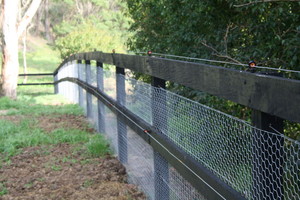 Stockworx Pty Ltd Pic 3 - Post N 2 Rail through bolted 4 strands of wire netted and clipped painted black and powered by solar electrics Maraylya NSW