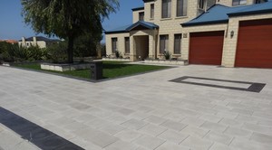 Castlestone Pic 5 - Castlestone driveway paving in Silver Grey colour with Charcoal border provides kerbside appeal