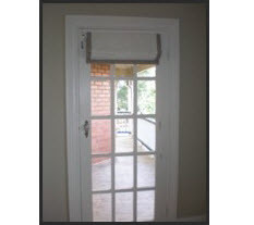 Classical Drops Pic 4 - Bonded edge Roman blind on French door