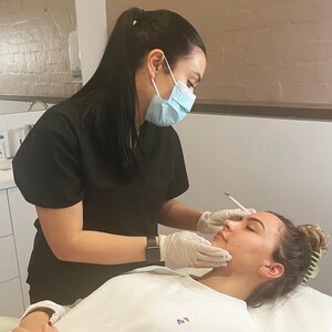 Bare Skin Boutique Pic 3 - Our Skin Expert Performing Treatment on our Client