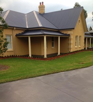 New Leaf Landscaping & Maintenance Pic 3 - Surrounding garden beds installed with timber edging