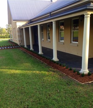 New Leaf Landscaping & Maintenance Pic 4 - Surrounding garden beds installed with timber edging