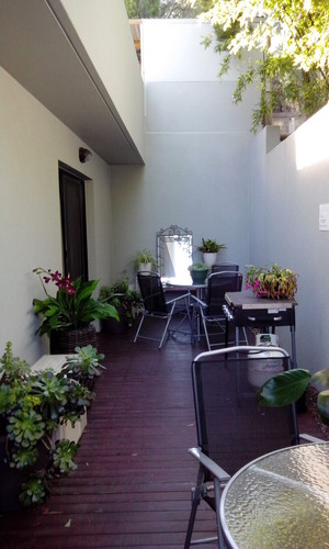 Hawley Beachside Accommodation Pic 5 - Private Verandah area outside units Gas BBQ plus outdoor table chairs