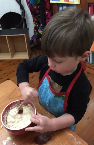 Happy Kids Family Day Care Pic 3 - Cooking activity in Happy Kids Family Day Care