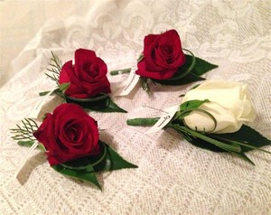 Bella Flora Designs Pic 4 - Groom and Groomsmen Buttonholes of Velvet Red Roses and Ivory Roses