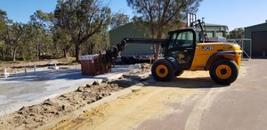 C & M Brick Transport Pic 4 - Slab placement with Telehandler