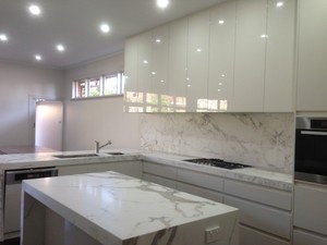 GTK Carpentry & Construction Pic 2 - stunning looking kitchen in hawthorn with beautiful bench tops and led lighting