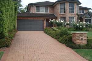 Pinnacle Landscapes & Concretors Pty Ltd Pic 3 - Paved driveway and garden