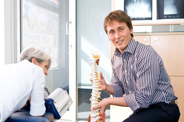 Skilton Mel Dr & Brett Dr Pic 1 - Dr Brett explains the importance of a healthy functioning nervous system to a patients wellbeing general health