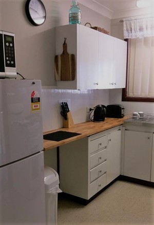 Norseman Apartments Pic 5 - Well equipped kitchen with fridge microwave full sized stove