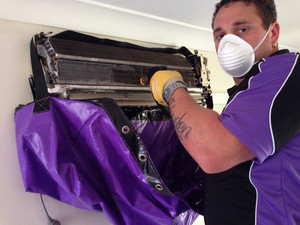 Express air con services Lake Macquarie Pic 4 - Dallas washing a coil on a split system unit